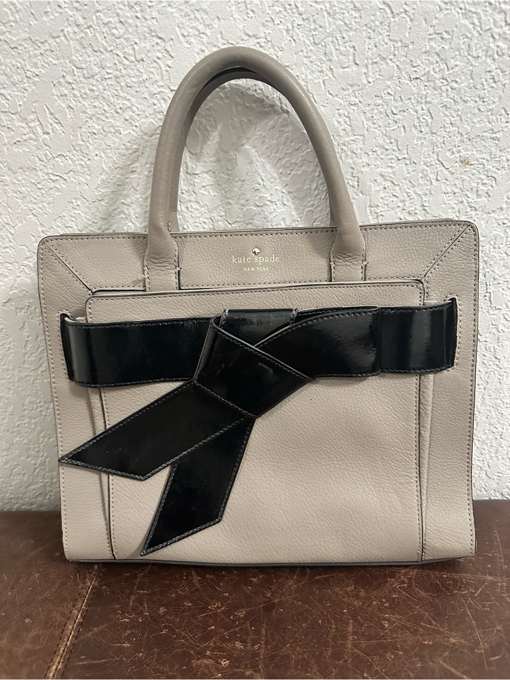 kate spade Taupe Leather Satchel with Black Patent Bow